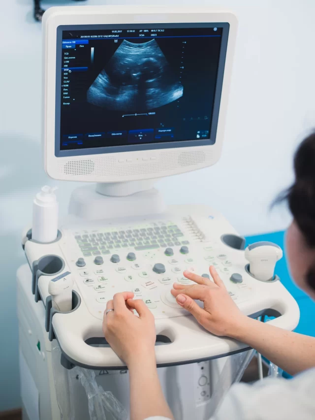 skillful-sonographer-using-ultrasound-machine-work